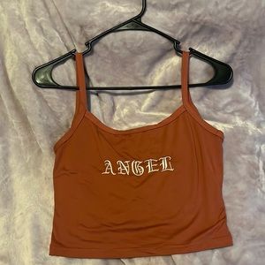 Dark orange tank top. Available for discount bundle with other qualifying items!